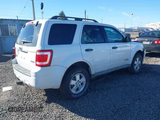2008 Ford Escape XLT with VIN 1FMCU93178KA09476, listed as a IAAI auction lot 41556200 with 190,149 mi miles. Bid and sale history available at carsss.com. Image 4.