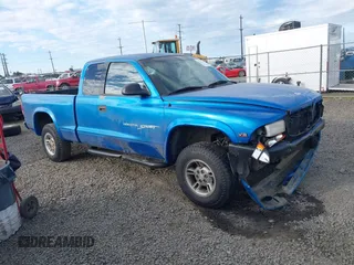 1998 Dodge Dakota SLT z VIN 1B7GG22Y6WS546615, wystawiony jako IAAI lot #42193501 z przebiegiem 146 376 mil mil oraz . Historia ofert i sprzedaży dostępna na DreamBid. Obrazek 1.
