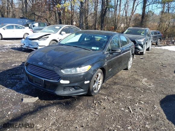 2016 Ford Fusion Energi Titanium with VIN 3FA6P0SU2GR162380, listed as a IAAI auction lot 41440825 with 241,323 mi miles. Bid and sale history available at carsss.com. Image 17.