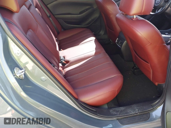 2021 Mazda 6 Carbon Edition with VIN JM1GL1WY4M1619533, listed as a IAAI auction lot 41979213 with 84,783 mi miles and . Bid and sale history available at DreamBid. Image 8.