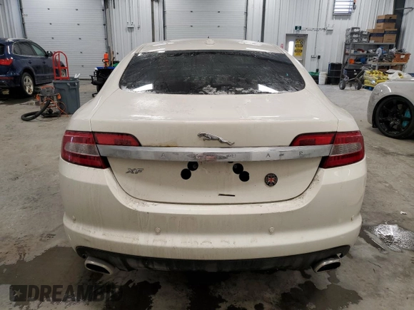 2009 Jaguar XF with VIN SAJXA06B69HR25287, listed as a Copart auction lot 42179625 with 222,124 mi miles and Salvage Title. Bid and sale history available at DreamBid. Image 6.