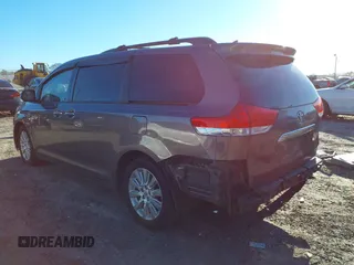2011 Toyota Sienna XLE with VIN 5TDDK3DC8BS009739, listed as a IAAI auction lot 41638710 with 235,396 mi miles. Bid and sale history available at carsss.com. Image 3.