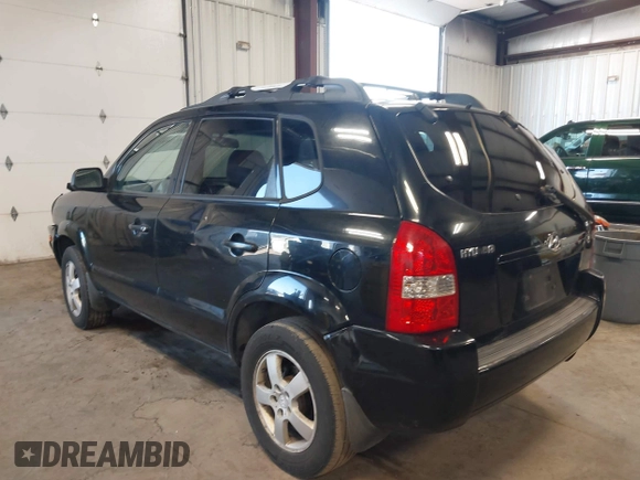 2006 Hyundai Tucson GL with VIN KM8JM12B96U252484, listed as a IAAI auction lot 42100855 with 273,655 mi miles. Bid and sale history available at carsss.com. Image 3.