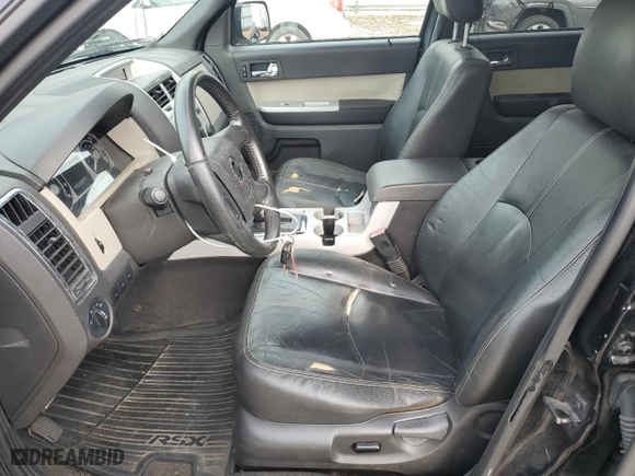 2009 Mercury Mariner Premier with VIN 4M2CU87719KJ20338, listed as a Copart auction lot 42972595 with 148,871 mi miles and Salvage Title. Bid and sale history available at carsss.com. Image 7.