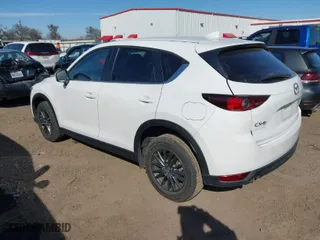 2021 Mazda CX-5 Touring with VIN JM3KFACM7M0375909, listed as a IAAI auction lot 41389941 with 31,191 mi miles. Bid and sale history available at carsss.com. Image 3.