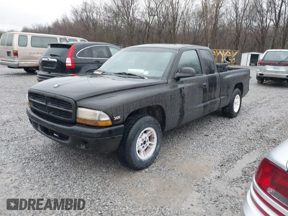 1999 Dodge Dakota SLT z VIN 1B7GL22X3XS181329, wystawiony jako IAAI lot #41480264 z przebiegiem 227 616 mil mil oraz . Historia ofert i sprzedaży dostępna na DreamBid. Obrazek 2.