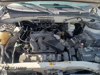 2005 Ford Escape XLT with VIN 1FMYU03135KA30662, listed as a IAAI auction lot 41970603 with 169,979 mi miles. Bid and sale history available at carsss.com. Image 1.