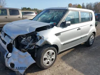 2011 Kia Soul with VIN KNDJT2A14B7322584, listed as a IAAI auction lot 40752860 with 110,742 mi miles. Bid and sale history available at carsss.com. Image 2.