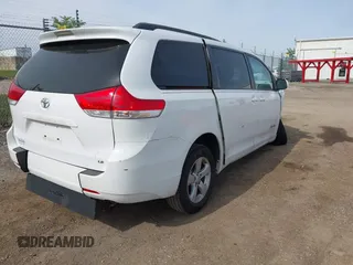 2014 Toyota Sienna LE AAS with VIN 5TDKK3DC0ES439163, listed as a IAAI auction lot 42155274 with Not provided miles and . Bid and sale history available at DreamBid. Image 4.
