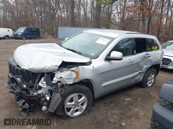2013 Jeep Grand Cherokee Laredo with VIN 1C4RJFAGXDC537367, listed as a IAAI auction lot 41906921 with 124,679 mi miles. Bid and sale history available at carsss.com. Image 14.