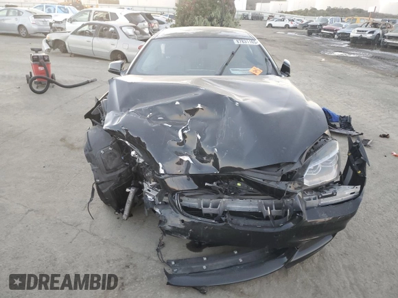 2015 BMW 6 Series 640i z VIN WBA6A0C59FD318390, wystawiony jako Copart lot #87831165 z przebiegiem Nie podano mil oraz Szkoda całkowita • Salvage title. Historia ofert i sprzedaży dostępna na DreamBid. Obrazek 5.