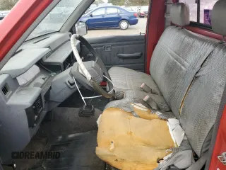 1991 Mitsubishi Mighty Max z VIN JA7FL24W2MP026041, wystawiony jako Copart lot #79159244 z przebiegiem 219 903 mil mil oraz Szkody całkowita. Historia ofert i sprzedaży dostępna na DreamBid. Obrazek 7.