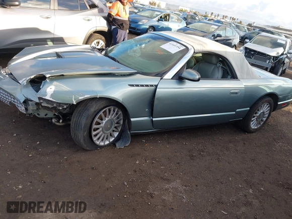 2004 Ford Thunderbird Pacific Coast Roadster with VIN 1FAHP63AX4Y107544, listed as a IAAI auction lot 41441354 with Not Provided miles and . Bid and sale history available at DreamBid. Image 14.