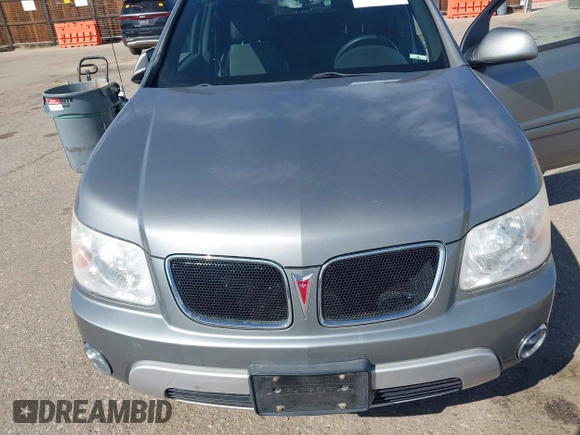 2006 Pontiac Torrent z VIN 2CKDL63F866073914, wystawiony jako IAAI lot #42014991 z przebiegiem 117 299 mil mil oraz . Historia ofert i sprzedaży dostępna na DreamBid. Obrazek 6.
