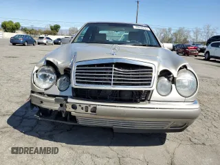 1997 Mercedes-Benz E-Class with VIN WDBJF55F4VJ032270, listed as a Copart auction lot 48010725 with 191,091 mi miles and Salvage Title. Bid and sale history available at carsss.com. Image 5.