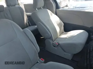 2015 Toyota Sienna L with VIN 5TDZK3DCXFS640245, listed as a IAAI auction lot 42310815 with 76,260 mi miles and . Bid and sale history available at DreamBid. Image 8.