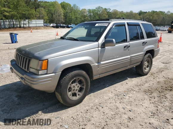 1998 Jeep Grand Cherokee Limited with VIN 1J4GZ78YXWC160346, listed as a Copart auction lot 52595655 with Not provided miles and Salvage title. Bid and sale history available at DreamBid. Image 1.
