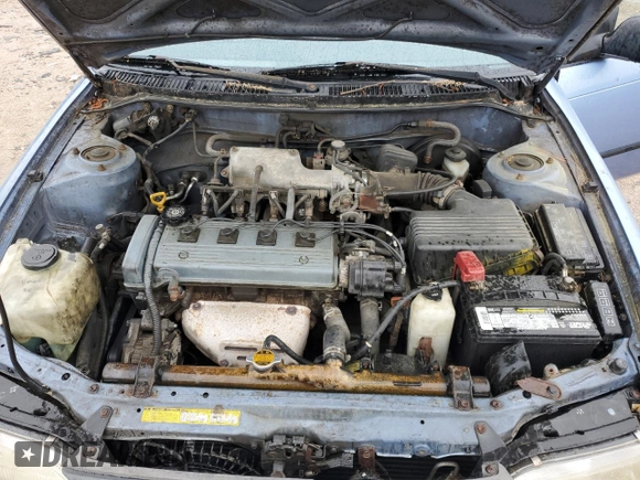 1995 Toyota Corolla DX with VIN 2T1AE09B5SC127586, listed as a Copart auction lot 57075045 with 244,969 mi miles and Salvage title. Bid and sale history available at DreamBid. Image 11.