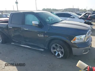 2016 Ram 1500 Laramie z VIN 1C6RR7NT9GS180433, wystawiony jako IAAI lot #41787072 z przebiegiem 197 584 mil mil oraz . Historia ofert i sprzedaży dostępna na DreamBid. Obrazek 1.