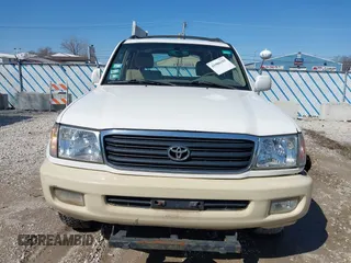 2000 Toyota Land Cruiser z VIN JT3HT05J5Y0126396, wystawiony jako IAAI lot #41986185 z przebiegiem 201 156 mil mil oraz . Historia ofert i sprzedaży dostępna na DreamBid. Obrazek 13.