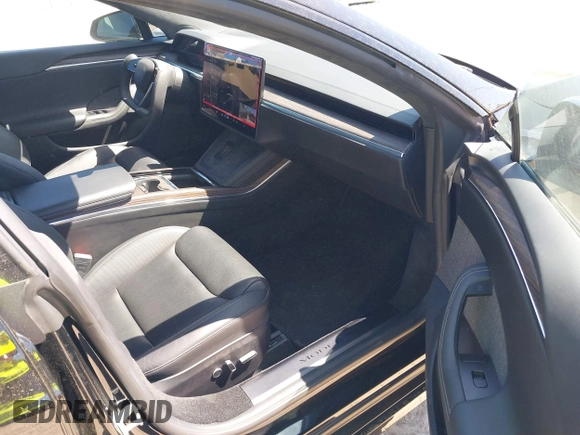 2021 Tesla Model S Plaid with VIN 5YJSA1E66MF452258, listed as a IAAI auction lot 41832000 with 42,845 mi miles and . Bid and sale history available at DreamBid. Image 5.