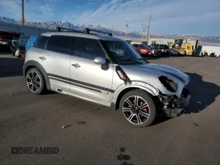 2015 MINI Countryman John Cooper Works with VIN WMWXD1C53FWS34815, listed as a Copart auction lot 74667224 with 94,971 mi miles and Salvage Title. Bid and sale history available at DreamBid. Image 4.
