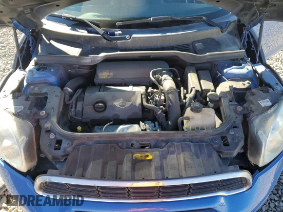 2012 MINI Countryman S with VIN WMWZC5C54CWL57389, listed as a Copart auction lot 49773945 with 120,889 mi miles and Salvage title. Bid and sale history available at DreamBid. Image 13.