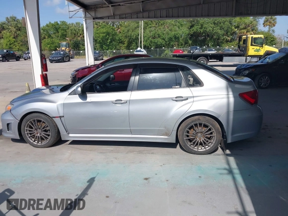 2013 Subaru Impreza Sedan WRX WRX with VIN JF1GV7E60DG014909, listed as a IAAI auction lot 42127645 with 70,360 mi miles. Bid and sale history available at carsss.com. Image 14.