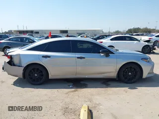2021 Toyota Avalon XSE Nightshade z VIN 4T1EZ1FB6MU069666, wystawiony jako IAAI lot #41684183 z przebiegiem 75 320 mil mil oraz . Historia ofert i sprzedaży dostępna na DreamBid. Obrazek 13.