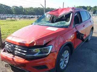 2018 Volkswagen Tiguan S with VIN 3VV1B7AX7JM016201, listed as a IAAI auction lot 42436045 with 139,168 mi miles and . Bid and sale history available at DreamBid. Image 2.
