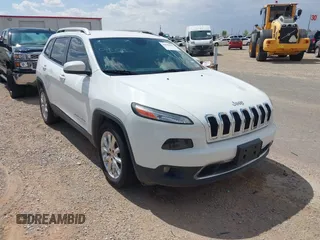 2016 Jeep Cherokee Limited z VIN 1C4PJLDB4GW233315, wystawiony jako IAAI lot #42655905 z przebiegiem 116 407 mil mil oraz . Historia ofert i sprzedaży dostępna na DreamBid. Obrazek 1.