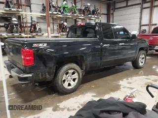 2015 Chevrolet Silverado 1500 LT with VIN 1GCVKREC1FZ186563, listed as a IAAI auction lot 41089120 with 156,261 mi miles. Bid and sale history available at carsss.com. Image 4.