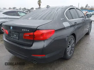 2019 BMW 5 Series 530e iPerformance with VIN WBAJA9C53KB399794, listed as a IAAI auction lot 41561874 with Not Provided miles. Bid and sale history available at carsss.com. Image 4.