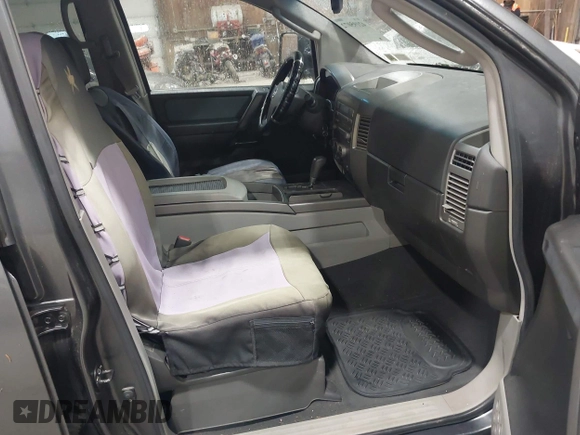 2004 Nissan Titan LE with VIN 1N6AA07B84N544745, listed as a IAAI auction lot 42195072 with 357,986 mi miles. Bid and sale history available at carsss.com. Image 5.