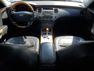 2007 Hyundai Azera SE with VIN KMHFC46F77A241607, listed as a Copart auction lot 59318345 with 198,664 mi miles and Salvage title. Bid and sale history available at DreamBid. Image 8.