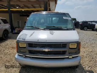 1999 Chevrolet Express Cargo with VIN 1GCHG35R3X1110004, listed as a Copart auction lot 59386095 with 141,925 mi miles and Salvage title. Bid and sale history available at DreamBid. Image 5.