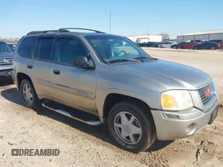 2003 GMC Envoy SLE with VIN 1GKDS13S532176330, listed as a IAAI auction lot 41757554 with 274,878 mi miles. Bid and sale history available at carsss.com. Image 1.