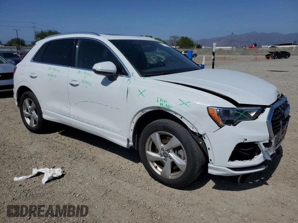 2020 Audi Q3 Premium with VIN WA1AECF32L1043479, listed as a Copart auction lot 57172925 with 52,907 mi miles and Salvage title. Bid and sale history available at DreamBid. Image 4.