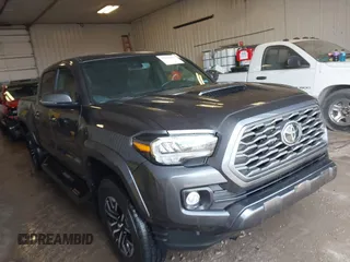 2023 Toyota Tacoma SR5 z VIN 3TMDZ5BN1PM159548, wystawiony jako IAAI lot #41684512 z przebiegiem 22 794 mil mil oraz . Historia ofert i sprzedaży dostępna na DreamBid. Obrazek 1.