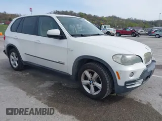 2010 BMW X5 35d with VIN 5UXFF0C52ALT75063, listed as a IAAI auction lot 41924828 with 104,513 mi miles. Bid and sale history available at carsss.com. Image 1.