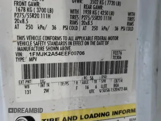 2014 Ford Expedition Max Limited z VIN 1FMJK2A54EEF00706, wystawiony jako Copart lot #87456134 z przebiegiem 143 382 mil mil oraz Szkoda całkowita • Salvage title. Historia ofert i sprzedaży dostępna na DreamBid. Obrazek 13.