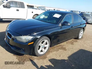2013 BMW 3 Series 320i with VIN WBA3B1C57DF461779, listed as a IAAI auction lot 41991156 with 134,592 mi miles. Bid and sale history available at carsss.com. Image 2.