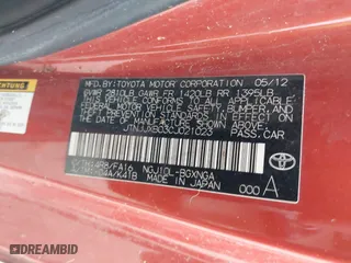2012 Scion iQ with VIN JTNJJXB03CJ021023, listed as a IAAI auction lot 41487646 with 143,735 mi miles. Bid and sale history available at carsss.com. Image 9.