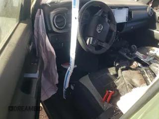 2021 Toyota Tacoma SR z VIN 3TYSZ5AN0MT035649, wystawiony jako Copart lot #75679984 z przebiegiem Nie podano mil oraz Szkoda całkowita • Salvage title. Historia ofert i sprzedaży dostępna na DreamBid. Obrazek 8.