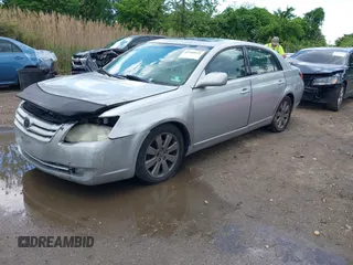 2005 Toyota Avalon XL with VIN 4T1BK36B85U013619, listed as a IAAI auction lot 42209645 with 173,520 mi miles and . Bid and sale history available at carsss.com. Image 2.