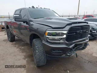 2024 Ram 2500 Laramie with VIN 3C6UR5FL1RG142556, listed as a IAAI auction lot 41428812 with 42,004 mi miles. Bid and sale history available at carsss.com. Image 1.