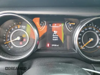 2021 Jeep Wrangler Unlimited 80th Anniversary z VIN 1C4HJXDG9MW790627, wystawiony jako Copart lot #82478604 z przebiegiem 29 928 mil mil oraz Szkoda całkowita • Salvage title. Historia ofert i sprzedaży dostępna na DreamBid. Obrazek 9.
