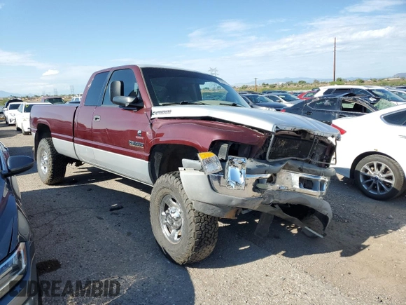 2001 Dodge Ram 2500 with VIN 1B7KF23661J228390, listed as a Copart auction lot 65231164 with 193,455 mi miles and Salvage Title. Bid and sale history available at carsss.com. Image 4.