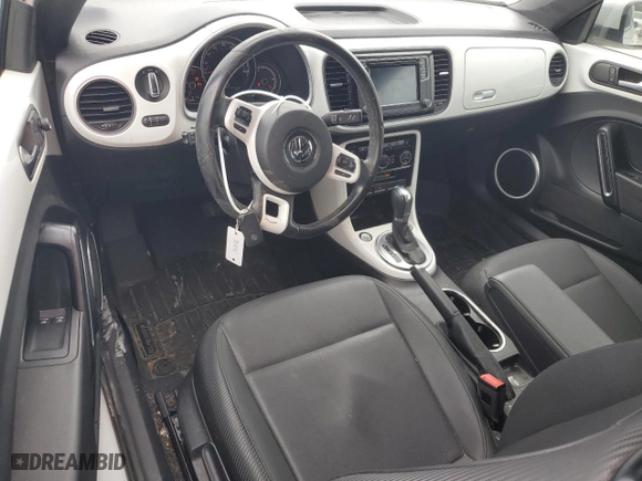 2019 Volkswagen Beetle SE with VIN 3VWJD7AT4KM710591, listed as a Copart auction lot 63178804 with 56,722 mi miles and Salvage Title. Bid and sale history available at carsss.com. Image 8.