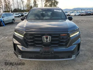 2023 Honda Pilot TrailSport with VIN 5FNYG1H63PB017335, listed as a Copart auction lot 75012154 with 5,870 mi miles and Salvage Title. Bid and sale history available at carsss.com. Image 5.
